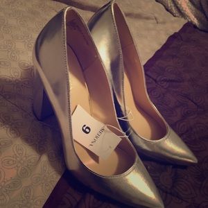 Pointed silver chunky heels!